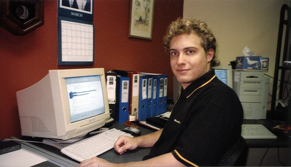 Nick early in his web design career at a desktop computer