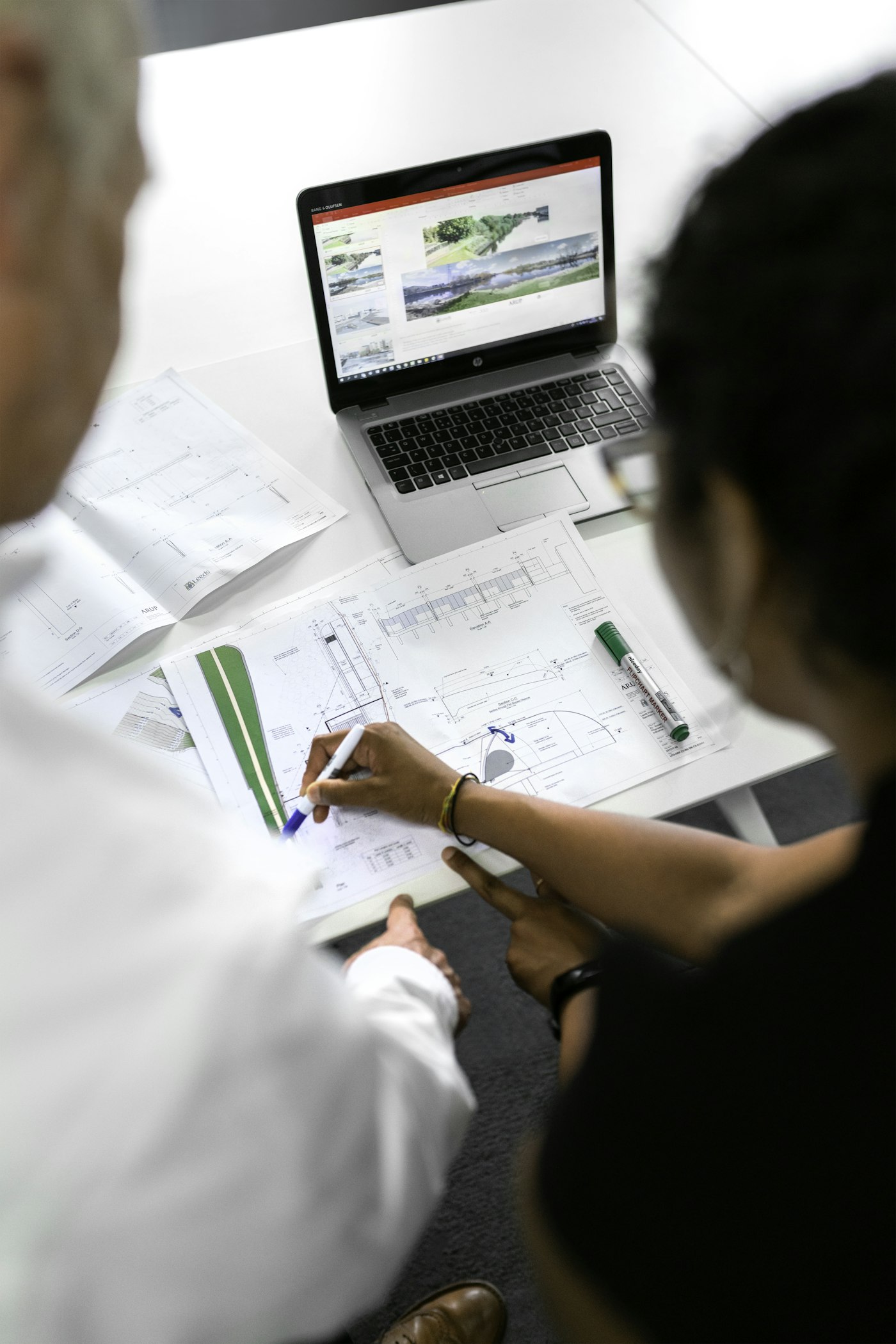 House plans spread across a table