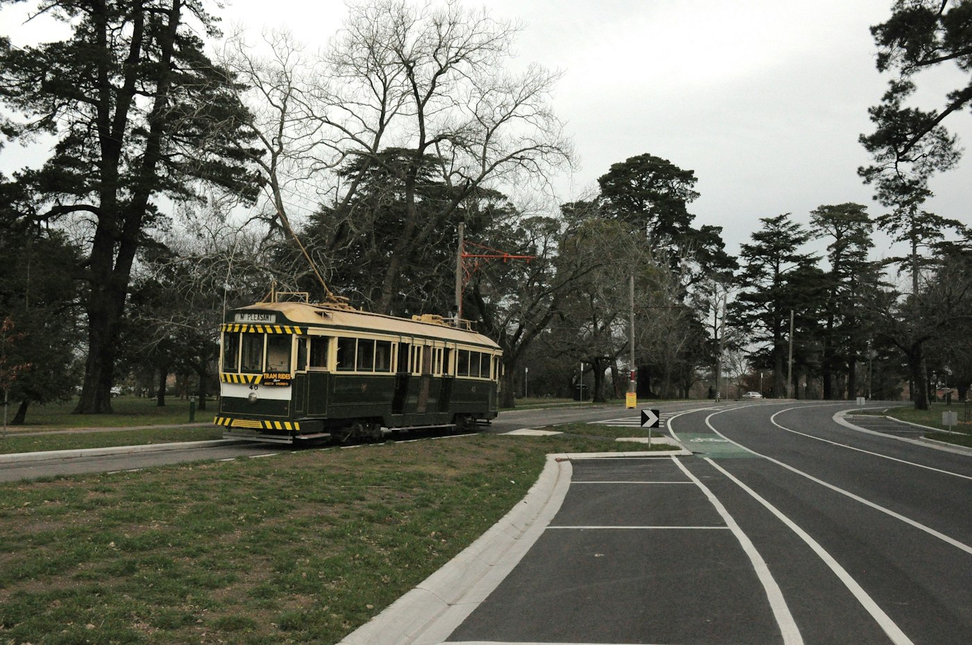 Heritage tram on a tree lined street near Lake Wendouree